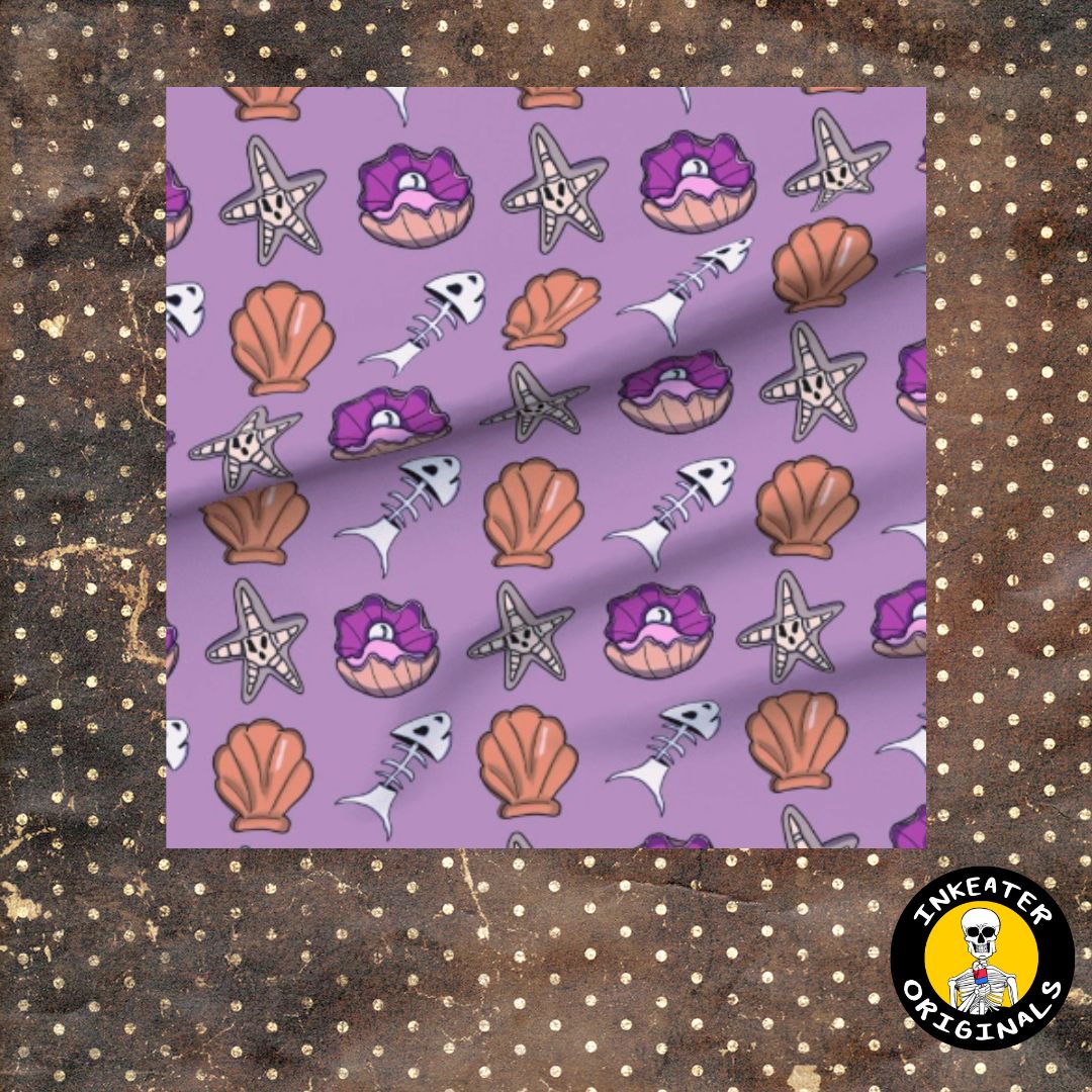 Lavender purple fabric with quirky seaside icons including pearl oyster, fish bone skeleton, starfish and scallop shell in a tossed repeat pattern