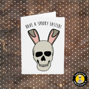 Greeting card with a hand-drawn skull with bunny ears, text 'HAVE A SPOOKY EASTER!' at the top, on a dotted background. Includes a brown envelope.